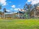 Gathering-friendly playground featuring modern equipment, shade structures, and a safe, enclosed play area at 719 21St N Ave, St Petersburg, FL 33704