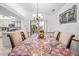 Bright dining room with sliding glass doors to the outdoor living space at 7948 Floral Dr, Weeki Wachee, FL 34607