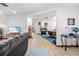 The airy living room flows into the dining area, featuring tile floors and ample space for entertaining at 7948 Floral Dr, Weeki Wachee, FL 34607