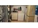 Practical laundry area with washer, dryer, and ample storage at 8006 N Temple Pl, Tampa, FL 33617