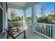 Inviting front porch featuring comfortable rocking chairs and serene views at 811 Winterside Dr, Apollo Beach, FL 33572