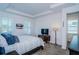 Spacious main bedroom featuring tray ceilings, plantation shutters and neutral decor creates a tranquil retreat at 811 Winterside Dr, Apollo Beach, FL 33572