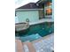 Beautiful pool with attached spa located in the backyard at 8137 Cottonwood Ct, Seminole, FL 33776