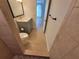 Bathroom with walk-in shower and updated vanity at 8765 Bardmoor Blvd # 107, Seminole, FL 33777