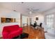 Open living room features gleaming wood floors and a pass-through to the kitchen at 1000 W Horatio St # 301, Tampa, FL 33606