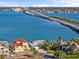 Waterfront property offering breathtaking views of the bay and the bridge with easy access to Tampa and the beaches at 1201 Bay Dr, Belleair Beach, FL 33786