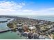 Aerial view showcases the waterfront property's location with quick access to beaches, waterways and St. Pete at 1201 Bay Dr, Belleair Beach, FL 33786