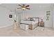 Expansive main bedroom offering views of the water and balcony at 1201 Bay Dr, Belleair Beach, FL 33786