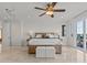 Spacious main bedroom with views of the water and balcony at 1201 Bay Dr, Belleair Beach, FL 33786