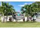 A Lakeview of Largo community sign with palm trees and blue sky in the background at 14130 Rosemary Ln # 3203, Largo, FL 33774