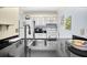 Clean kitchen featuring dark countertops and stainless steel appliances at 14130 Rosemary Ln # 3203, Largo, FL 33774