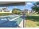 Exterior view of the shuffleboard courts and surrounding community landscape at 14130 Rosemary Ln # 3203, Largo, FL 33774