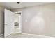 Bedroom providing access to a hallway at 14820 Rue De Bayonne # 205, Clearwater, FL 33762