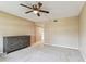 Bedroom featuring a dresser and ceiling fan, with a view into the bathroom at 14820 Rue De Bayonne # 205, Clearwater, FL 33762