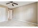 Spacious bedroom with ample closet space and neutral carpet at 14820 Rue De Bayonne # 205, Clearwater, FL 33762