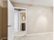 Hallway with access to bathroom and closet at 14820 Rue De Bayonne # 205, Clearwater, FL 33762
