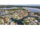 Aerial view of waterfront homes showing water access to the ocean at 2031 Tanglewood Ne Way, St Petersburg, FL 33702
