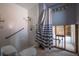 Damaged bathroom featuring tile walls, shower, commode and shower safety bar at 2031 Tanglewood Ne Way, St Petersburg, FL 33702