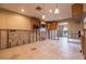 Spacious kitchen with tile flooring, a window, and pendant lighting. Ready for renovation at 2031 Tanglewood Ne Way, St Petersburg, FL 33702