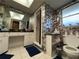 Bathroom featuring a toilet, shower, vanity, unique wallpaper, and stylish decor at 3112 Desoto Rd, Sarasota, FL 34234
