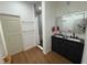 Modern bathroom with a double vanity, sleek mirrors, and a glass-enclosed shower at 3112 Desoto Rd, Sarasota, FL 34234