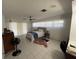 Bedroom featuring white tile flooring, a bed, and bright natural light at 3112 Desoto Rd, Sarasota, FL 34234