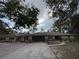 A charming single story home with a large driveway and attached two car garage at 3112 Desoto Rd, Sarasota, FL 34234