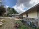 Charming single-story home features a stone accent wall, front yard and private driveway at 3112 Desoto Rd, Sarasota, FL 34234