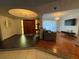 Foyer with living room, decorative lighting, and hardwood floors at 3112 Desoto Rd, Sarasota, FL 34234