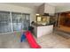 Open living area has a kitchen pass-through, backyard view and plenty of space at 3112 Desoto Rd, Sarasota, FL 34234