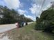 View of the road in front of the property, showcasing the landscape and neighborhood at 3112 Desoto Rd, Sarasota, FL 34234
