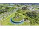 Stunning aerial view of green spaces, waterways, and homes within the vibrant community at 31837 Cannon Rush Dr, San Antonio, FL 33576