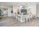 Stylish bar area with modern lighting, counter seating, and a selection of beverages at 31837 Cannon Rush Dr, San Antonio, FL 33576