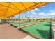 Bocce ball courts under a yellow awning, providing a fun outdoor activity at 31837 Cannon Rush Dr, San Antonio, FL 33576