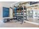 Gym with weights, exercise balls, and other fitness equipment in front of a mirrored wall at 31837 Cannon Rush Dr, San Antonio, FL 33576
