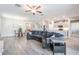 Open-concept living space showcases seamless transitions between kitchen, dining, and living areas, ideal for modern living at 31837 Cannon Rush Dr, San Antonio, FL 33576