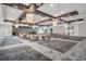 Large meeting space with elegant chandeliers, neutral walls, and modern carpet flooring at 31837 Cannon Rush Dr, San Antonio, FL 33576