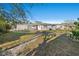 Wide backyard featuring a stone path and well maintained lawn at 3218 Fauna St, Sarasota, FL 34235