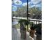 Enclosed patio featuring decorative bonsai at 3265 Beneva Rd # 202, Sarasota, FL 34232