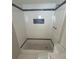 Modern bathroom with tiled walk-in shower at 3320 Jackson Dr, Holiday, FL 34691