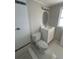 Bathroom featuring modern vanity and toilet at 3320 Jackson Dr, Holiday, FL 34691