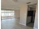 Spacious living room features durable laminate floors and plenty of natural light at 3320 Jackson Dr, Holiday, FL 34691