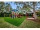 A community playground offers slides, swings and a covered picnic area at 3830 Moreno Dr, Palm Harbor, FL 34685