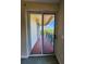 View to the balcony of an apartment with tile floor and green railing at 4801 Osprey S Dr # 209, St Petersburg, FL 33711