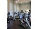Well-equipped gym featuring treadmills, ellipticals, and stationary bikes for a complete workout at 4801 Osprey S Dr # 209, St Petersburg, FL 33711