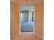 View from hallway into living area showcasing natural light and an open floor plan at 4801 Osprey S Dr # 209, St Petersburg, FL 33711