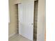 Pantry with sliding doors and white wire shelving for organized storage at 4801 Osprey S Dr # 209, St Petersburg, FL 33711