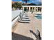 Resort-style pool area with lounge chairs and poolside landscaping, ideal for relaxation at 4801 Osprey S Dr # 209, St Petersburg, FL 33711