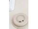 Close-up of a flush mount smoke detector at 4801 Osprey S Dr # 209, St Petersburg, FL 33711