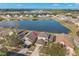 Beautiful home with a spacious backyard overlooking a serene lake, perfect for relaxing and entertaining at 5236 Clover Mist Dr, Apollo Beach, FL 33572